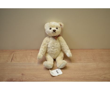 A modern Steiff Limited Edition Teddy Bear, 663697 2010 Year Bear with button, tag and card box