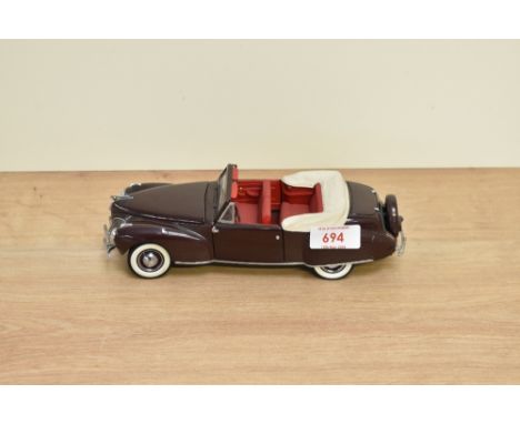 A Franklin Mint 1:24 scale Die-cast, 1941 Lincoln Continental with certificate, in card box with polystyrene cradle