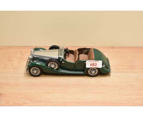 A 1989 Franklin Mint 1:24 scale Die-cast, 1938 Alvis 4.3 Litre with tag and certificates, in card box with polystyrene cradle