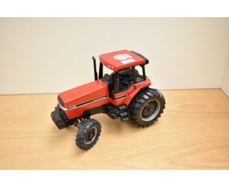 An ERTL die-cast, 7130 Case International Tractor, 70th Anniversary of CT Haytons of Kendal