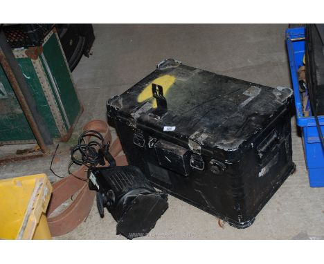 A military style trunk, siren, theatre spotlight etc.