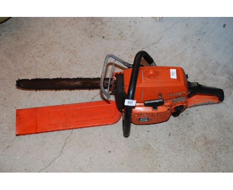 Husqvarna 380S petrol chainsaw and guard.