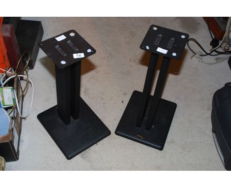 A pair of metal speaker stands.