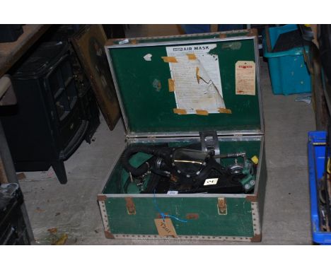 Scuba diving equipment in a trunk.