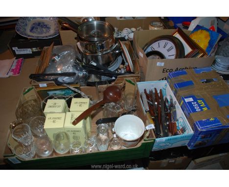 Four boxes of stainless steel cookware, a winch bracket, fishing floats, glasses, etc.