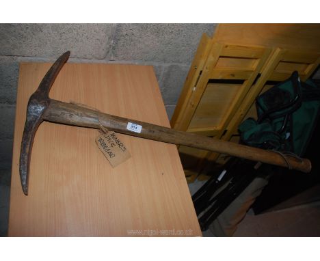 A pick axe - possible ex Tredegar mining.