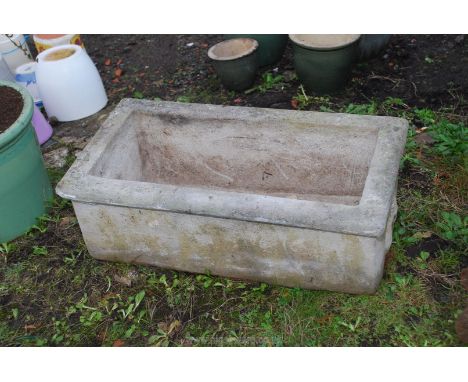 Rectangular concrete planter, 23'' x 12'' x 8''.