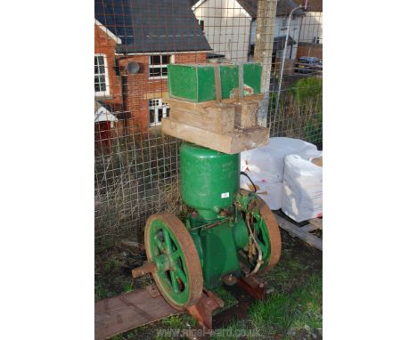 A Lister Spec A29 hopper-cooled petrol stationary engine, not run at the sale-room but turns and has compression. Serial No: 