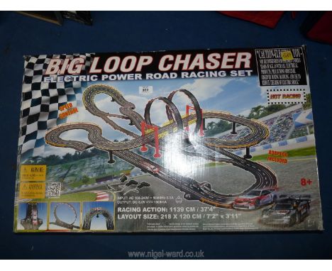 A Big Loop chaser road racing car game set.