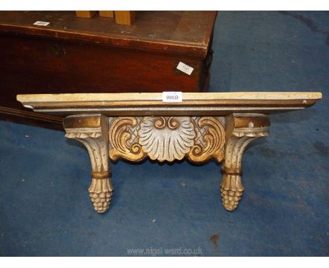 A wall mounted small shelf with sconces/ornate brackets, 24 1/2" long x 7 3/4" deep.