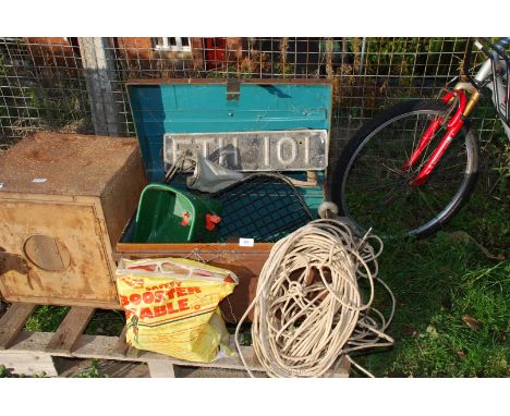 Metal trunk containing jump leads, rope, garden hand tools etc.