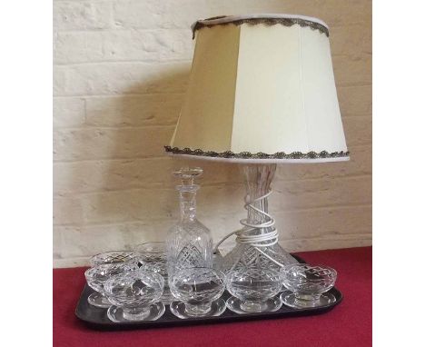 Eight Stuart crystal sundae dishes, cut glass wine decanter and cut glass table lamp complete with shade. Condition report: s