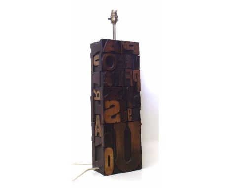 Table lamp, wooden base, covered in old wooden printing block letters and numbers.  51 cm (20") high. Condition report: see t