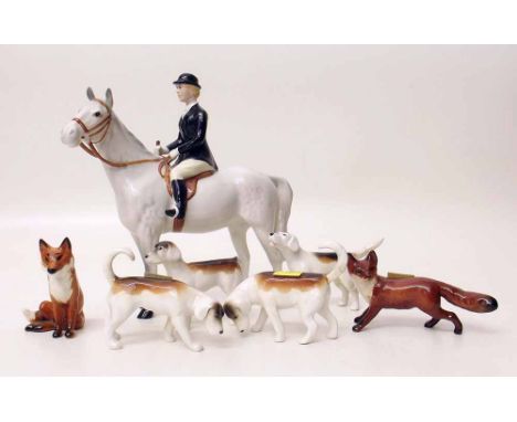 Beswick hunts woman together wtih two foxes and four hounds. Condition report: see terms and conditions