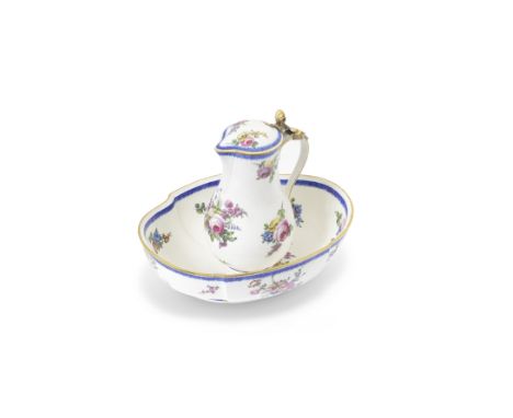 A Sèvres silver-gilt-mounted jug and basin, dated 1768-69Pot 'à l'eau tourné' et jatte ovale of the first size, painted with 