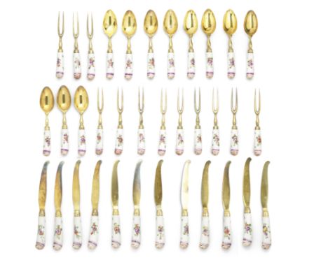 A cased set of silver-gilt-mounted Doccia cutlery handles, circa 1780, the cutlery by Luigi Vernazzi, Parma, circa 1810Each h