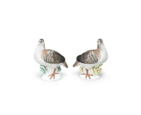 A pair of Meissen models of partridges, mid 18th centuryNaturalistically modelled and coloured, the bases applied with yellow