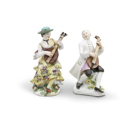 A Meissen figure of a lady playing the lute, circa 1755Seated on a tree stump, wearing a yellow skirt with Kakiemon flowers, 