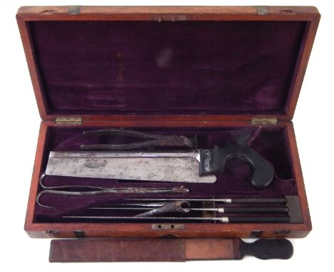 19th century army field amputation kit, the saw named Coxeter, fitted in brass bound mahogany case together with leather stro