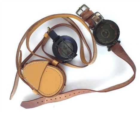Aviators leg compass, on leather strap, together with one other British Army type compass.