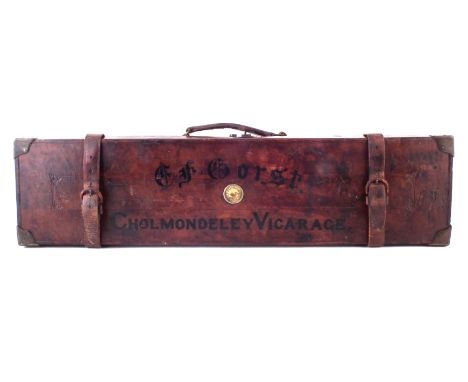 Leather gun case of local interest, the top named 'C.F. Gorst Cholmondeley Vicarage' bearing retailers plaque Robert R. Rhode
