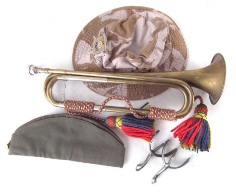 Collection of Militaria, to include a military trumpet by Barratts, broad arrow marked, pair of spurs, Soviet Russian cap and