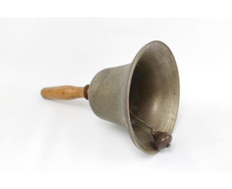 Vintage Brass Bell of turned form on Walnut handle 