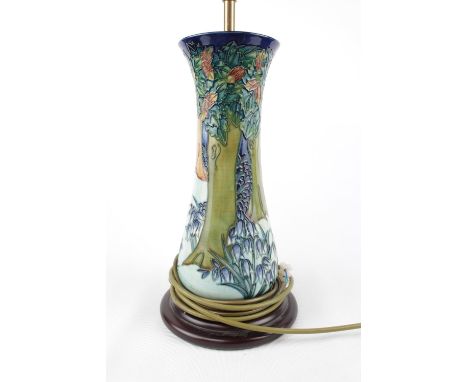 Large Moorcroft table lamp with shade, of Forrest design and wooden base. 68cm in Height 