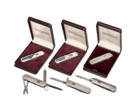 Victorinox-Classic-Messer in 925er Sterling-SilberVictorinox, Schweiz. 1) Glatt, mit Box. (3+/–) – 2) Rau, mit Box. (2-/–) – 