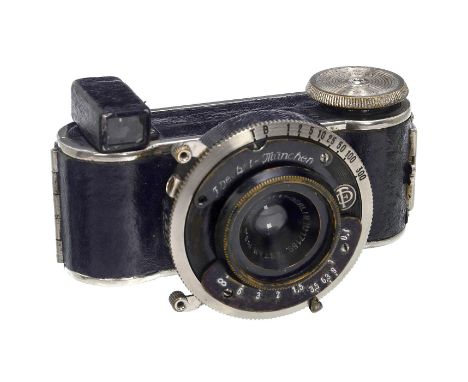 Mini-Fex Astan, 1932Fritz Kaftanksi, Berlin. Miniaturkamera für 36 Aufnahmen 13 x 18 mm auf 16 mm breiten, unperforierten Fil