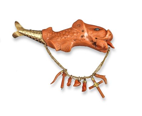 A 19th century carved coral grotesque fish brooch, finely carved with rose-cut diamond eyes and realistically engraved gold t
