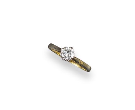 A diamond soliatire ring, the brilliant-cut diamond weighs approximately 0.45cts and in set in yellow gold. Size L.