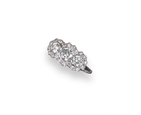 A diamond three stone cluster ring, the brilliant-cut diamonds weigh approximately 1.25ct in total and are set in white gold.