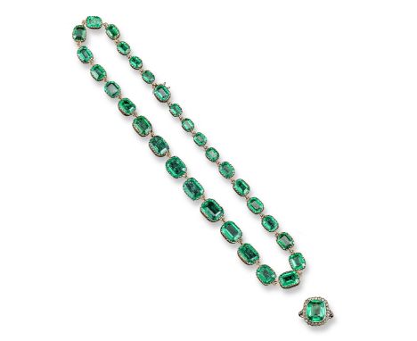 A green paste rivière necklace, the graduated emerald cut green stones are set in gold cut down collets. 39cm long. With a ma