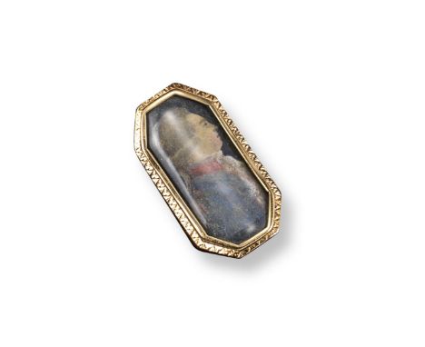 A late 18th century portrait ring, the octagonal glazed portrait depicting a gentleman looking right with blue jacket and red