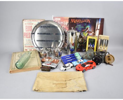 A Collection of Various Sundries to include Reproduction Elvis Presley Poster, Darts, Diecast Toys, Fishing Reels, Vintage Ta