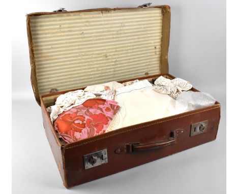 A Vintage Leather Travelling Case Containing Linens, Lace Etc 