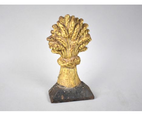 A Cold Painted Cast Iron Door Stop in the Form of a Wheatsheaf, 19cms High 