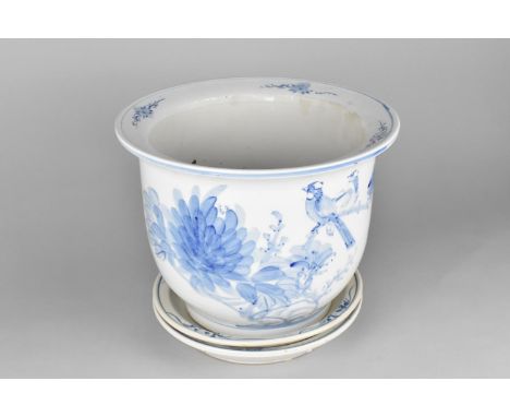 A Circular Chinese Blue and White Jardiniere Decorated with Birds together with Two Blue and White Planter Stands, 31cms Diam