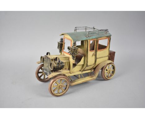 A Modern Cold Painted Tin Plate Model of a Vintage Car, 26cms Long 