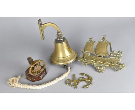 A Collection of Brass Ornaments to include Wall Mounting Ships Type Bell, Ships Wheel Nut Cracker, Galleon Pipe Rack and a Fo