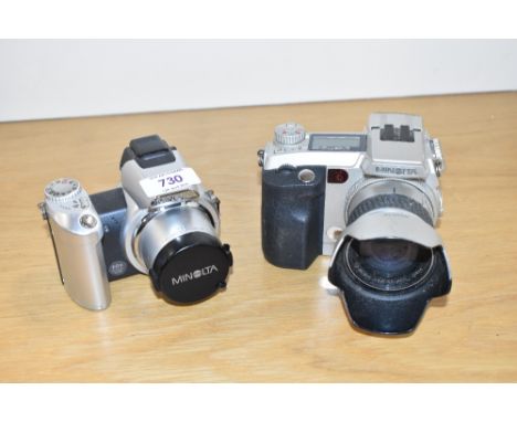 Two Minolta digital cameras