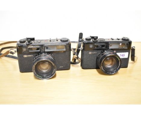 Two Yashica Electra 35 cameras with Color-Yashinon 1:1,7 45mm lenses. One is spares and repairs