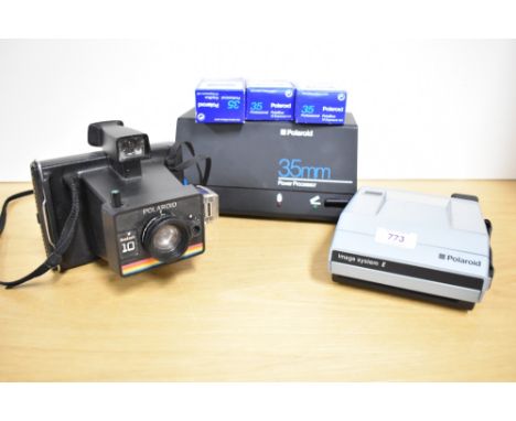 A Polaroid Image System E and a Polaroid Instant 10 camera with a Polaroid 35mm Power Processor