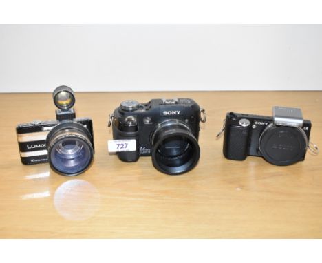A Sony Smart Zoom VX digital Camera with a Sony HD AVCHO digital camera and a Lumix DMC FS7
