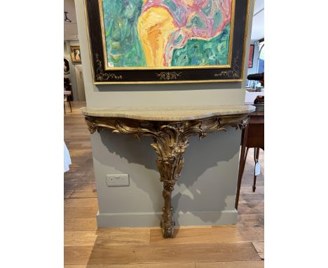 Property of a Lady 18th/Early 19th CenturyA serpentine giltwood marble top console table (new marble)Dimensions: 33 in. (H) x