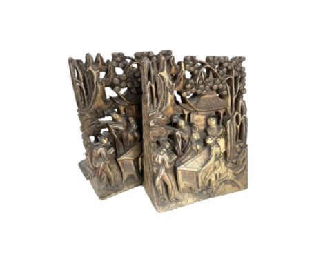To be sold without reserveProperty of a LadyChinese20th CenturyA pair of carved wood bookends, decorated with figures in conv