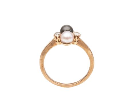 To be sold without reserve Property of a Lady. Circa 1890, A black and white pearl and diamond ring, set with old cut diamond