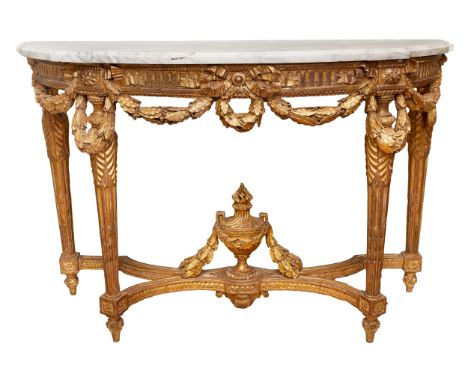 Property of a Gentleman. Jacob Brothers A Louis XVI giltwood and marble-top console table With ornate foliate drapery, Corint