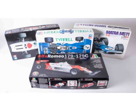 Four boxed scale models including Alpha Romeo 179/179C unbuilt kit, some loose parts bagged, Tyrrell Ford F1, release from 20